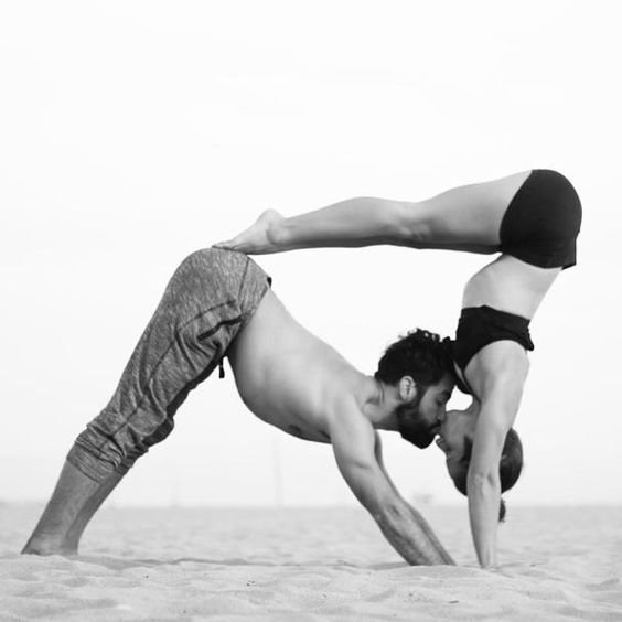 The back-to-back seated meditation pose is one of the best couple yoga poses for beginners and will have you and your partner returning to a state of empathy, trust, and goodwill with one another.